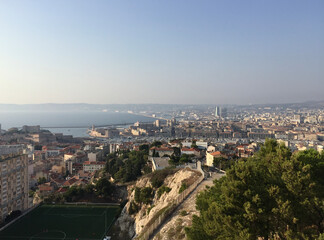 Panoramic view of the Saint-Victor neighborhood with the Old Port of Marseille (Vieux-Port) and Le Panier neighborhood in the background, seen from the Notre-Dame de la Garde basilica.
