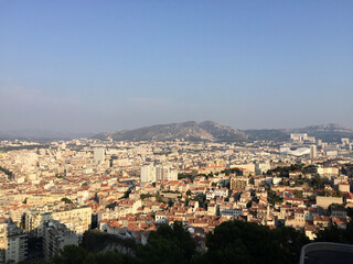 Panoramic view of Marseille's southern neighborhoods with the the Massif de Saint-Cyr in the...