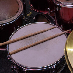 Fototapeta na wymiar Drum sticks on the old snare drum