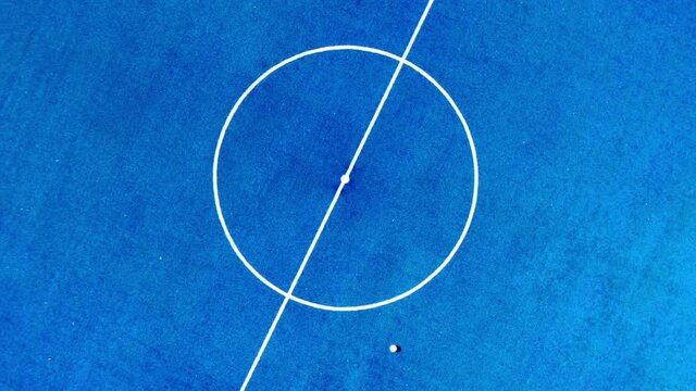 Aerial view blue field futsal sport outdoor white line center.