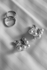 Precious jewelry for the bride for the wedding Earrings and rings engagement of the newlyweds