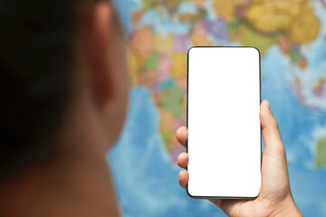Woman holding smartphone with white screen
