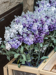 Fake Violet Lavender Flowers inside a Wooden Vase