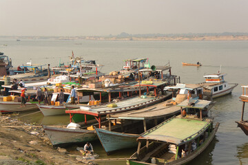 Fototapeta na wymiar Boats on the Irrawaddy River, Myanmar