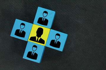 colored cubes with employee and boss icons. the concept of HR or hiring