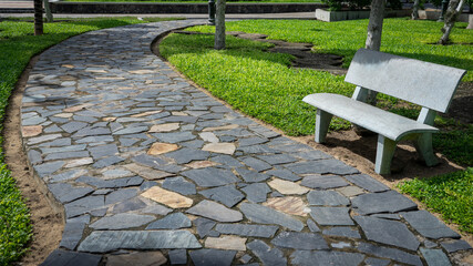 Pebble pavement walkway in the park - 454932035