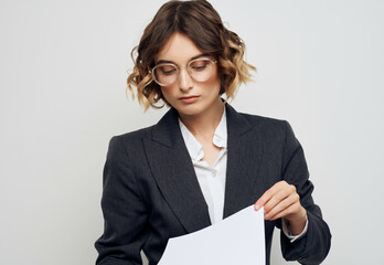 Businesswoman documents in hand executive office