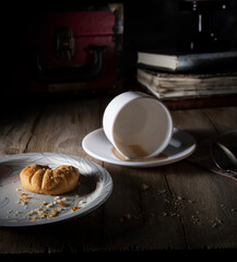 Cookies on a white saucer on a morning rustic table