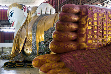 Myanmar. Yangon. The large reclining buddha of Kyaukhtatgyi Pagoda