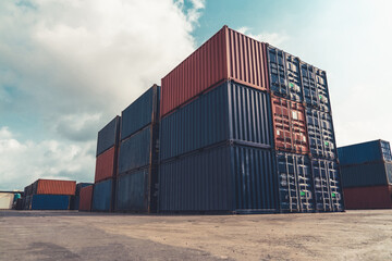 Cargo container for overseas shipping in shipyard with heavy machine . Logistics supply chain...