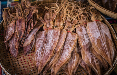 Dried squids are sold in a seafood market at Laem Chabang Fishing Village, Thailand.