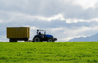 tractor in farmland field