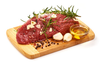 Fresh beef meat with spices, isolated on white background.