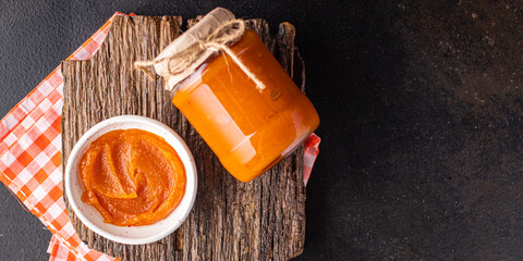 pumpkin jam sweet dessert autumn harvesting canned food fresh portion ready to eat meal snack on...