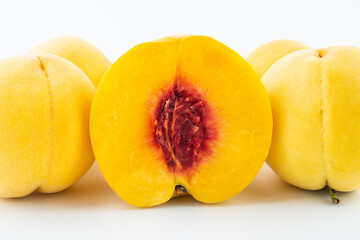 Red heart yellow peach cut on white background