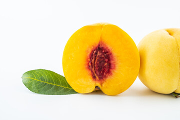 Red heart yellow peach cut on white background