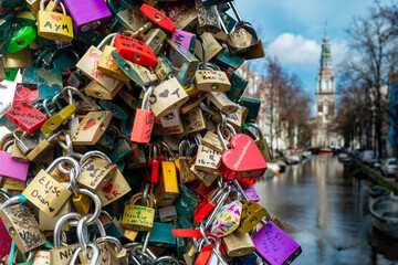 Love locks hang on the Staalbrug over the Groenburgwal in Amsterdam, Noord-Holland Province, The Netherlands