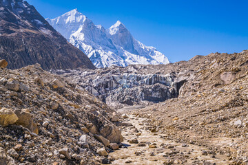 Gomukh, snout of the Gangotri Glacier, from where Bhagirathi or Ganges River originates. Gangotri glacier is one of the largest in the Himalayas at 4023 m  in Uttarkashi, Uttarakhand, India. - obrazy, fototapety, plakaty