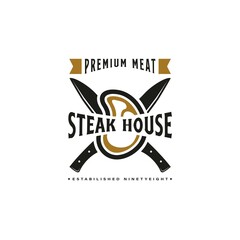 Vintage Retro Steak House Logo Design. With crossed cleavers or knives, and beef or meat icons. Premium and luxury label or sticker