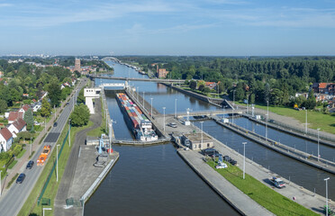 Shipping container at the Wijnegem lock at the Albert Canal, Antwerp, Belgium