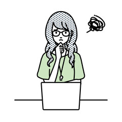 デスクで座ってPCを開いて困っている教師の女性