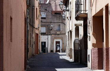 street of the old mediterranean town of begur on the costa brava with old historical buildings