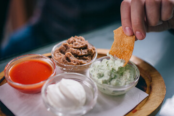 Tortilla chips in Mexican restaurant closeup