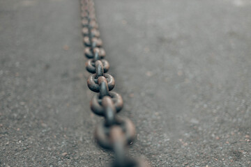 Grey metal chain on background