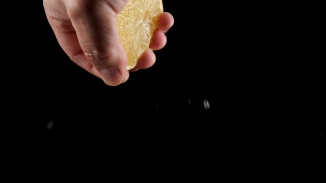 Squeezing fresh lemon slow mo 