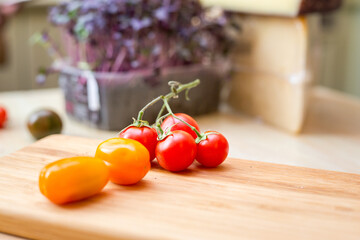 fresh tomatoes on a chopping board