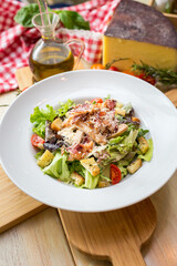 fresh salad on table with props