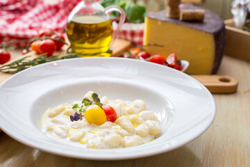 pasta with tomato and cheese with props