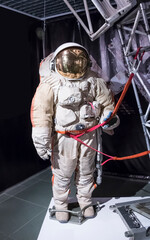 cosmonaut's spacesuit for space flight rocket and the stars of the planet