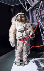 Naklejka premium cosmonaut's spacesuit for space flight rocket and the stars of the planet