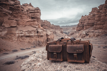 old suitcase on the mountains