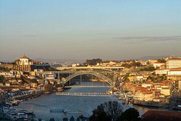Fototapeta na wymiar Panoramic view on old part of Porto city in Portugal on sunset
