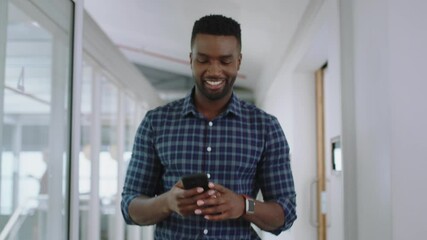african american businessman using smartphone walking through office texting sending emails successful female executive checking messages on mobile phone arriving at workplace 4k - Powered by Adobe