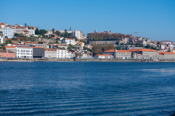 Fototapeta na wymiar Walking along Douro river from Porto to Atlantic ocean coast and view on river and houses of Porto, Portugal