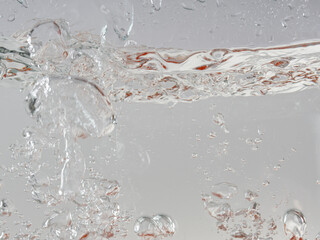 Bubbles and splashes in the water. Close-up. There is room for text.