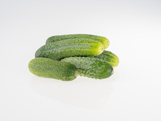 Fresh cucumbers on a white background. isolated Close-up