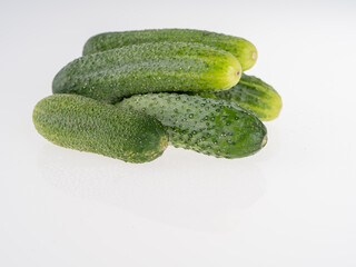 Fresh cucumbers on a white background. isolated Close-up