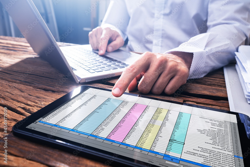 Poster electronic spreadsheet on analyst computer