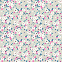 Beautiful floral pattern in small abstract flowers. Small white flowers. Pastel gray background. Ditsy print. Floral seamless background. The elegant the template for fashion prints. Stock pattern.