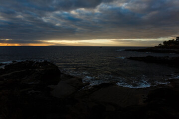 Old stone pier in sunset time at Tenerife, Canary Islands, Spain