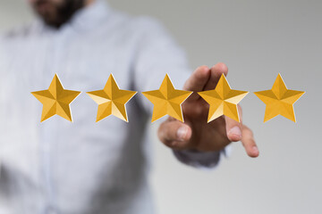 pointing five star symbol to increase rating of company