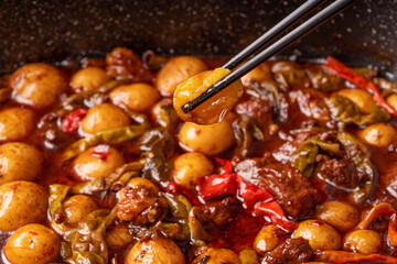 Roasted small potatoes with beef sauce