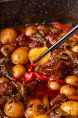 Roasted small potatoes with beef sauce