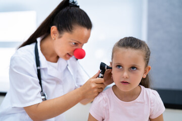 Fototapeta premium Otolaryngology Infection. Child Doctor Checking Ear