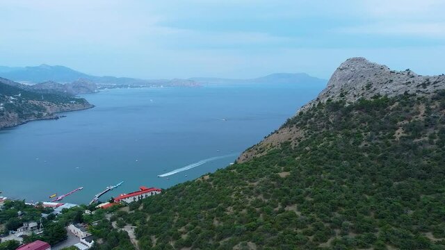 Sea in crimea trail Galiyna quadcopter from the air blue sky mountains grass trees mountain mountains coastline, tourism ea beautiful iew, water clouds. Cape rest, bay sea top view crimea mountain