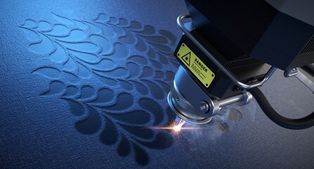 Laser cutter close up, engraving geometric motifs on a piece of fabric. 
